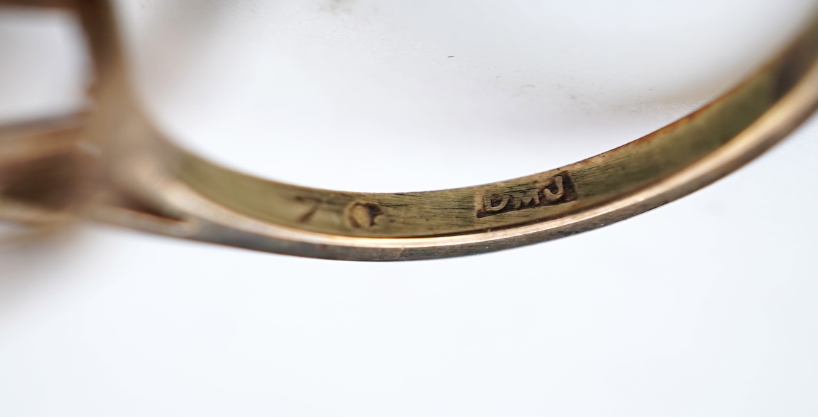 Two 19th century white metal mounted horn snuff mulls, one engraved 'John Calder', the other with inset tiger's eye quartz cabochon, both a.f., largest 83mm.